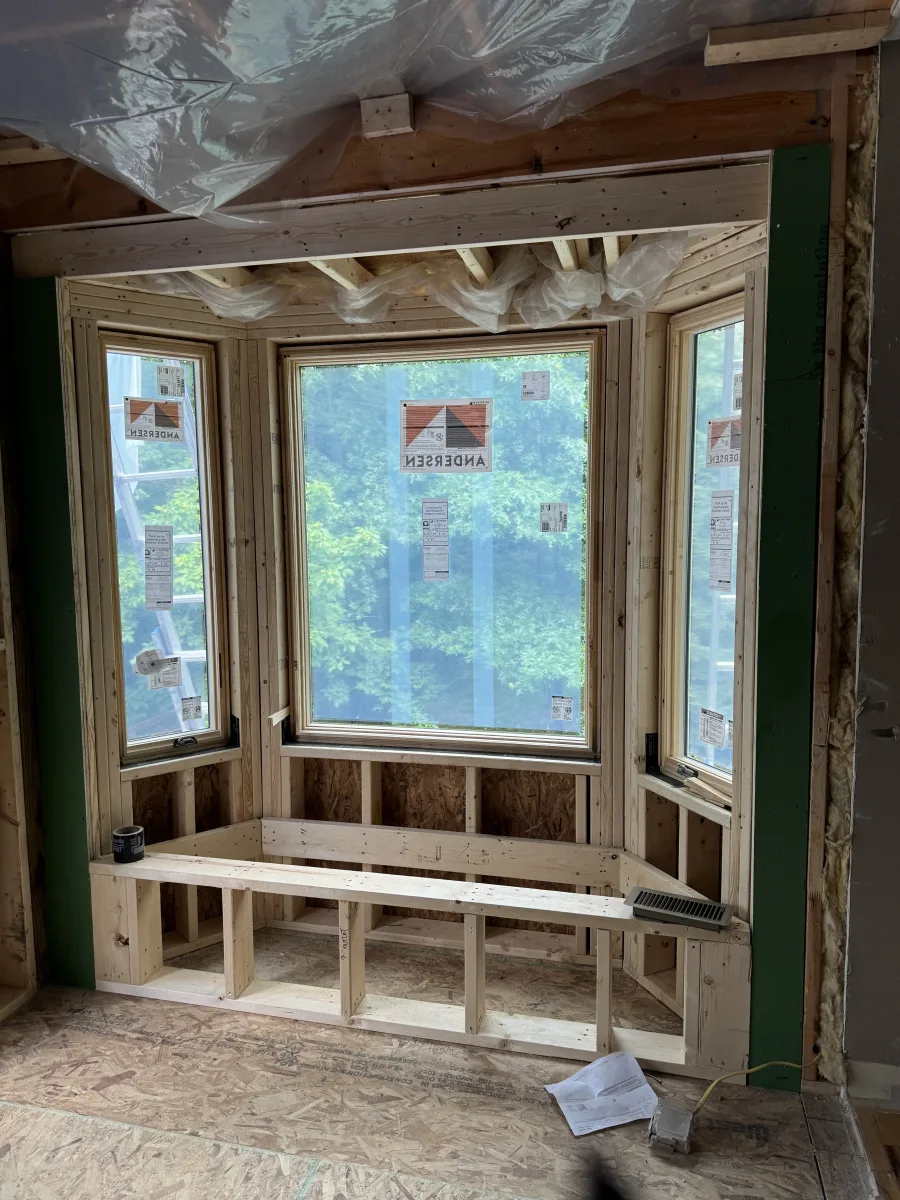 Columbus 2 Story Addition framing, new Andersen bay windows & framed window seat. Exterior remodeling in progress.
